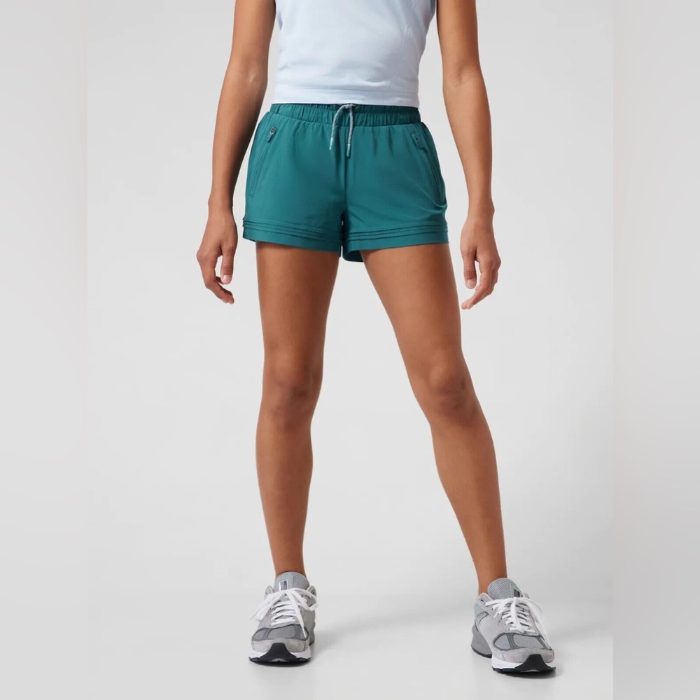 ATHLETA GIRL ROAD TRIPPIN' SHORTS IN BOREALIS GREEN